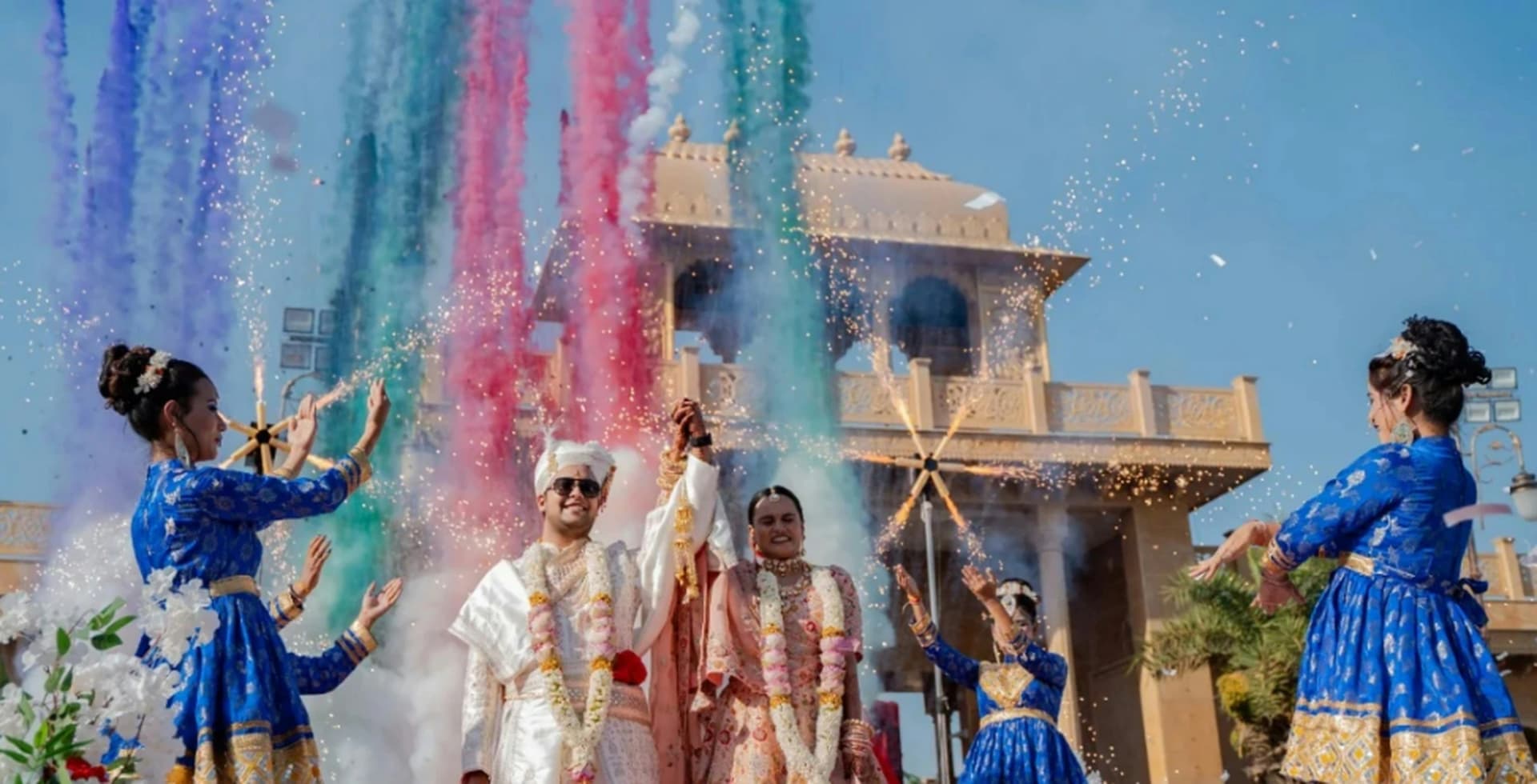 Varmala ceremony with fireworks and color shots